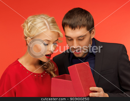 To use this stock image in your creative project, please select the size you need over to the right and click the "Add to Cart" button.
Your downloaded image will come with the Cutcaster watermark removed so don’t worry about the watermark you see on this page. man and woman looking inside the gift box stock photo, picture of man and woman looking inside the box by Syda Productions