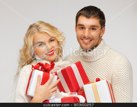 To use this stock image in your creative project, please select the size you need over to the right and click the "Add to Cart" button.
Your downloaded image will come with the Cutcaster watermark removed so don’t worry about the watermark you see on this page. family couple in a sweaters with gift boxes stock photo, picture of family couple in a sweaters with gift boxes by Syda Productions