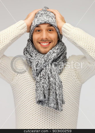 To use this stock image in your creative project, please select the size you need over to the right and click the "Add to Cart" button.
Your downloaded image will come with the Cutcaster watermark removed so don’t worry about the watermark you see on this page. handsome man in warm sweater, hat and scarf stock photo, picture of handsome man in warm sweater, hat and scarf. by Syda Productions