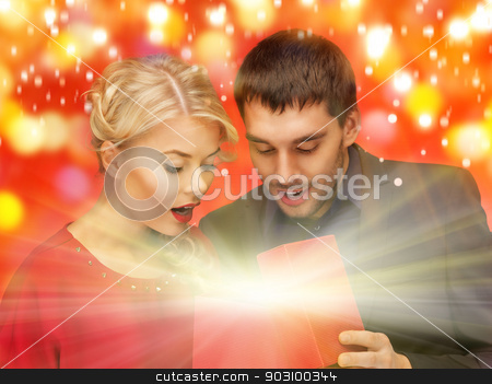 To use this stock image in your creative project, please select the size you need over to the right and click the "Add to Cart" button.
Your downloaded image will come with the Cutcaster watermark removed so don’t worry about the watermark you see on this page. man and woman looking inside the gift box stock photo, picture of man and woman looking inside the box by Syda Productions