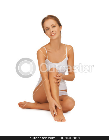 To use this stock image in your creative project, please select the size you need over to the right and click the "Add to Cart" button.
Your downloaded image will come with the Cutcaster watermark removed so don’t worry about the watermark you see on this page. woman in cotton undrewear touching her legs stock photo, picture of beautiful woman in cotton undrewear touching her legs by Syda Productions