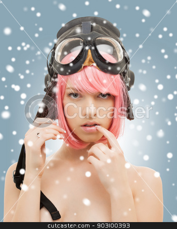 To use this stock image in your creative project, please select the size you need over to the right and click the "Add to Cart" button.
Your downloaded image will come with the Cutcaster watermark removed so don’t worry about the watermark you see on this page. pink hair girl in aviator helmet with snow stock photo, picture of pink hair girl in aviator helmet with snow by Syda Productions