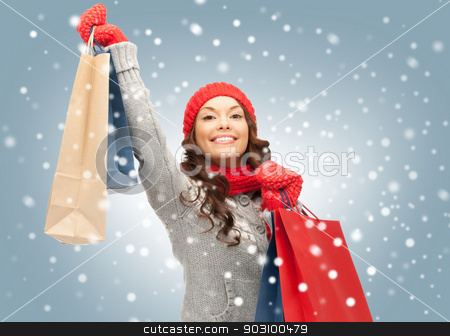 To use this stock image in your creative project, please select the size you need over to the right and click the "Add to Cart" button.
Your downloaded image will come with the Cutcaster watermark removed so don’t worry about the watermark you see on this page. shopper stock photo, picture of lovely woman with shopping bags by Syda Productions
