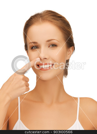 To use this stock image in your creative project, please select the size you need over to the right and click the "Add to Cart" button.
Your downloaded image will come with the Cutcaster watermark removed so don’t worry about the watermark you see on this page. beautiful woman pointing to nose stock photo, picture of beautiful woman pointing to nose by Syda Productions