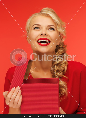 To use this stock image in your creative project, please select the size you need over to the right and click the "Add to Cart" button.
Your downloaded image will come with the Cutcaster watermark removed so don’t worry about the watermark you see on this page. lovely woman in red dress with opened gift box stock photo, picture of lovely woman in red dress with opened gift box by Syda Productions