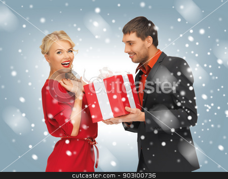 To use this stock image in your creative project, please select the size you need over to the right and click the "Add to Cart" button.
Your downloaded image will come with the Cutcaster watermark removed so don’t worry about the watermark you see on this page. man and woman with present stock photo, picture of man and woman with present by Syda Productions