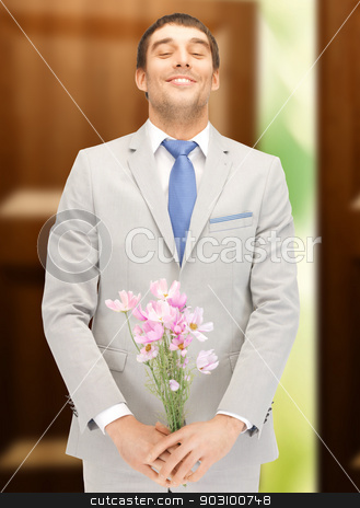 To use this stock image in your creative project, please select the size you need over to the right and click the "Add to Cart" button.
Your downloaded image will come with the Cutcaster watermark removed so don’t worry about the watermark you see on this page. handsome man with flowers in hand stock photo, picture of handsome man with flowers in hand by Syda Productions