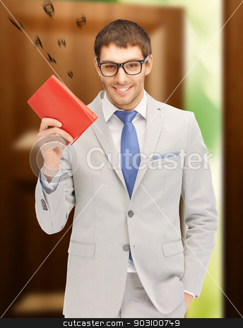 To use this stock image in your creative project, please select the size you need over to the right and click the "Add to Cart" button.
Your downloaded image will come with the Cutcaster watermark removed so don’t worry about the watermark you see on this page. happy man with book stock photo, bright picture of happy man with book by Syda Productions