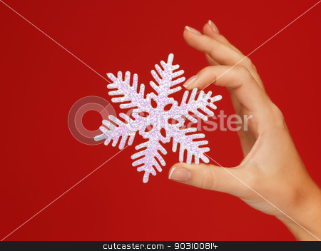 To use this stock image in your creative project, please select the size you need over to the right and click the "Add to Cart" button.
Your downloaded image will come with the Cutcaster watermark removed so don’t worry about the watermark you see on this page. woman's hands holding a snowflake stock photo, closeup picture of woman's hands holding a snowflake by Syda Productions