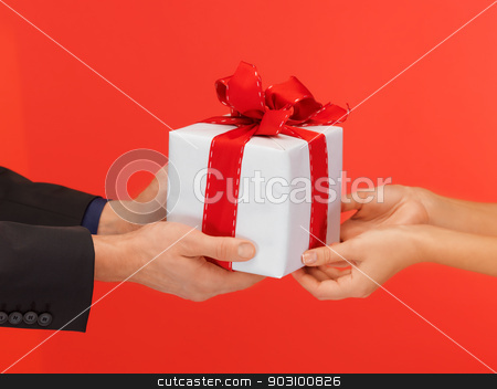 To use this stock image in your creative project, please select the size you need over to the right and click the "Add to Cart" button.
Your downloaded image will come with the Cutcaster watermark removed so don’t worry about the watermark you see on this page. man and woman's hands with gift box stock photo, closeup picture of man and woman's hands with gift box by Syda Productions