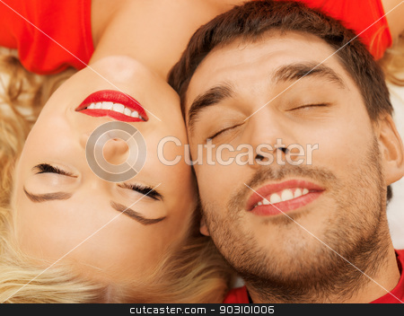 To use this stock image in your creative project, please select the size you need over to the right and click the "Add to Cart" button.
Your downloaded image will come with the Cutcaster watermark removed so don’t worry about the watermark you see on this page. happy couple lying at home with closed eyes stock photo, happy couple lying at home with closed eyes (focus on woman) by Syda Productions