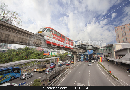 To use this stock image in your creative project, please select the size you need over to the right and click the "Add to Cart" button.
Your downloaded image will come with the Cutcaster watermark removed so don’t worry about the watermark you see on this page. Kuala Lumpur Monorail stock photo, KUALA LUMPUR, MALAYSIA - FEBRUARY 7, 2014: Kuala Lumpur Monorail Transportation System in Downtown KL Malaysia. The monorail is one of the several train systems in Kuala Lumpur. by Jit Lim