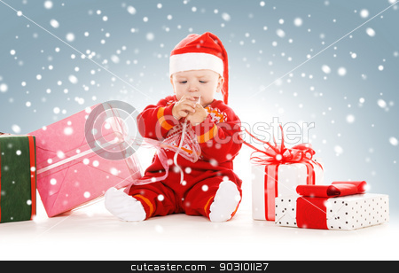 To use this stock image in your creative project, please select the size you need over to the right and click the "Add to Cart" button.
Your downloaded image will come with the Cutcaster watermark removed so don’t worry about the watermark you see on this page. santa helper baby with christmas gifts stock photo, picture of santa helper baby with christmas gifts by Syda Productions
