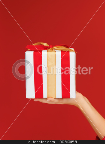 To use this stock image in your creative project, please select the size you need over to the right and click the "Add to Cart" button.
Your downloaded image will come with the Cutcaster watermark removed so don’t worry about the watermark you see on this page. woman's hands holding a gift box stock photo, closeup picture of woman's hands holding a gift box by Syda Productions