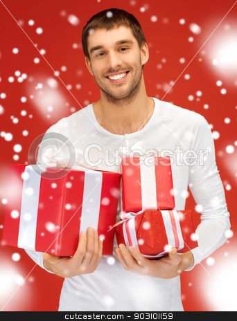To use this stock image in your creative project, please select the size you need over to the right and click the "Add to Cart" button.
Your downloaded image will come with the Cutcaster watermark removed so don’t worry about the watermark you see on this page. man holding many gift boxes stock photo, bright picture of handsome man holding many gift boxes. by Syda Productions