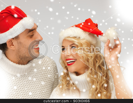 To use this stock image in your creative project, please select the size you need over to the right and click the "Add to Cart" button.
Your downloaded image will come with the Cutcaster watermark removed so don’t worry about the watermark you see on this page. family couple in sweaters and santa's hats stock photo, picture of family couple in sweaters and santa's hats by Syda Productions
