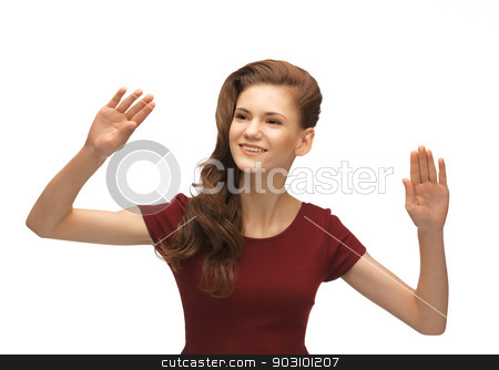 To use this stock image in your creative project, please select the size you need over to the right and click the "Add to Cart" button.
Your downloaded image will come with the Cutcaster watermark removed so don’t worry about the watermark you see on this page. teenage girl working with something imaginary stock photo, picture of teenage girl in red dress working with something imaginary by Syda Productions
