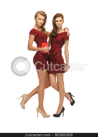 To use this stock image in your creative project, please select the size you need over to the right and click the "Add to Cart" button.
Your downloaded image will come with the Cutcaster watermark removed so don’t worry about the watermark you see on this page. two teenage girls in red dresses with clutches stock photo, picture of two teenage girls in red dresses with clutches by Syda Productions