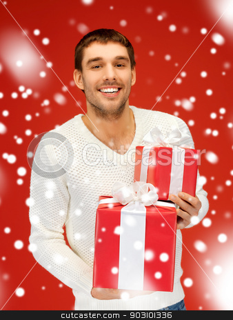 To use this stock image in your creative project, please select the size you need over to the right and click the "Add to Cart" button.
Your downloaded image will come with the Cutcaster watermark removed so don’t worry about the watermark you see on this page. man holding many gift boxes stock photo, bright picture of handsome man holding many gift boxes. by Syda Productions