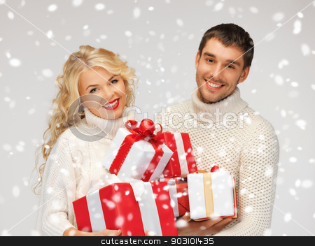 To use this stock image in your creative project, please select the size you need over to the right and click the "Add to Cart" button.
Your downloaded image will come with the Cutcaster watermark removed so don’t worry about the watermark you see on this page. family couple in a sweaters with gift boxes stock photo, picture of family couple in a sweaters with gift boxes by Syda Productions