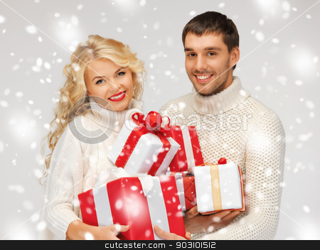 To use this stock image in your creative project, please select the size you need over to the right and click the "Add to Cart" button.
Your downloaded image will come with the Cutcaster watermark removed so don’t worry about the watermark you see on this page. family couple in a sweaters with gift boxes stock photo, picture of family couple in a sweaters with gift boxes by Syda Productions