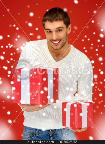 To use this stock image in your creative project, please select the size you need over to the right and click the "Add to Cart" button.
Your downloaded image will come with the Cutcaster watermark removed so don’t worry about the watermark you see on this page. man holding many gift boxes stock photo, bright picture of handsome man holding many gift boxes. by Syda Productions