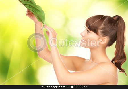 To use this stock image in your creative project, please select the size you need over to the right and click the "Add to Cart" button.
Your downloaded image will come with the Cutcaster watermark removed so don’t worry about the watermark you see on this page. woman with green leaf stock photo, picture of happy woman with green leaf by Syda Productions