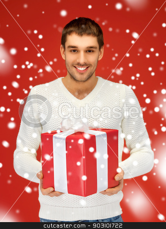 To use this stock image in your creative project, please select the size you need over to the right and click the "Add to Cart" button.
Your downloaded image will come with the Cutcaster watermark removed so don’t worry about the watermark you see on this page. handsome man with a gift stock photo, bright picture of handsome man with a gift . by Syda Productions
