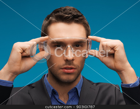 To use this stock image in your creative project, please select the size you need over to the right and click the "Add to Cart" button.
Your downloaded image will come with the Cutcaster watermark removed so don’t worry about the watermark you see on this page. businessman in protective glasses stock photo, picture of handsome businessman in protective glasses. by Syda Productions