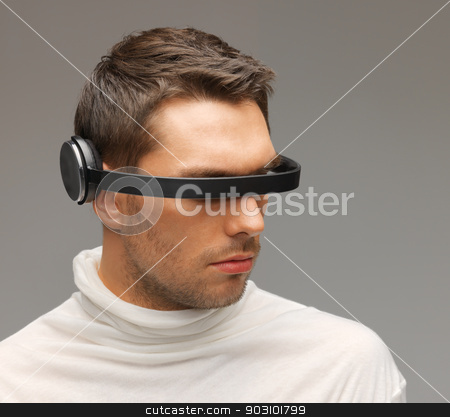 To use this stock image in your creative project, please select the size you need over to the right and click the "Add to Cart" button.
Your downloaded image will come with the Cutcaster watermark removed so don’t worry about the watermark you see on this page. man with futuristic glasses stock photo, picture of handsome man with futuristic glasses. by Syda Productions