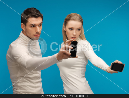 To use this stock image in your creative project, please select the size you need over to the right and click the "Add to Cart" button.
Your downloaded image will come with the Cutcaster watermark removed so don’t worry about the watermark you see on this page. man and woman with modern gadgets stock photo, picture of man and woman with modern gadgets by Syda Productions