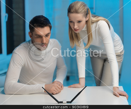 To use this stock image in your creative project, please select the size you need over to the right and click the "Add to Cart" button.
Your downloaded image will come with the Cutcaster watermark removed so don’t worry about the watermark you see on this page. man and woman working with something stock photo, picture of man and woman working with something imaginary by Syda Productions