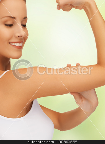 To use this stock image in your creative project, please select the size you need over to the right and click the "Add to Cart" button.
Your downloaded image will come with the Cutcaster watermark removed so don’t worry about the watermark you see on this page. sporty woman flexing her biceps stock photo, closeup picture of sporty woman flexing her biceps by Syda Productions