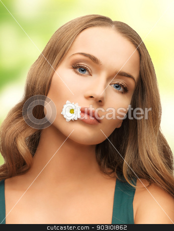 To use this stock image in your creative project, please select the size you need over to the right and click the "Add to Cart" button.
Your downloaded image will come with the Cutcaster watermark removed so don’t worry about the watermark you see on this page. woman with camomile in mouth stock photo, picture of beautiful woman with camomile in mouth by Syda Productions