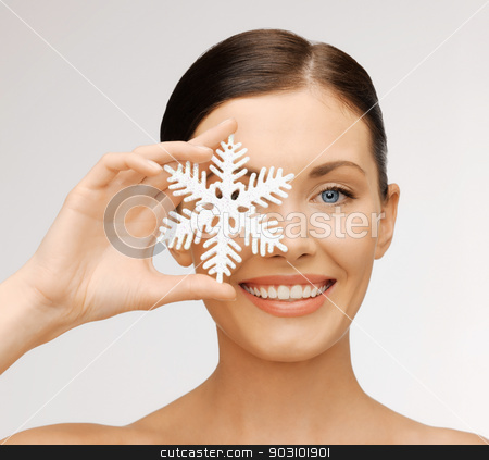 To use this stock image in your creative project, please select the size you need over to the right and click the "Add to Cart" button.
Your downloaded image will come with the Cutcaster watermark removed so don’t worry about the watermark you see on this page. woman with snowflake stock photo, bright picture of beautiful woman with snowflake by Syda Productions