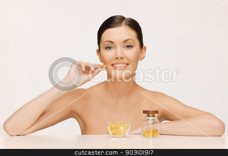 To use this stock image in your creative project, please select the size you need over to the right and click the "Add to Cart" button.
Your downloaded image will come with the Cutcaster watermark removed so don’t worry about the watermark you see on this page. woman with vitamins stock photo, bright picture of beautiful woman with vitamins by Syda Productions