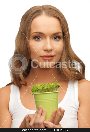 To use this stock image in your creative project, please select the size you need over to the right and click the "Add to Cart" button.
Your downloaded image will come with the Cutcaster watermark removed so don’t worry about the watermark you see on this page. woman with green grass in pot stock photo, bright picture of woman with green grass in pot by Syda Productions