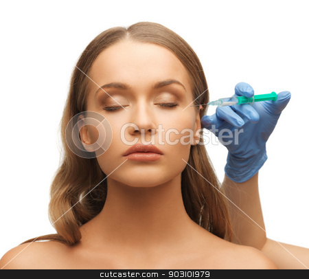 To use this stock image in your creative project, please select the size you need over to the right and click the "Add to Cart" button.
Your downloaded image will come with the Cutcaster watermark removed so don’t worry about the watermark you see on this page. woman face and beautician hands stock photo, picture of woman face and beautician hands with syringe by Syda Productions