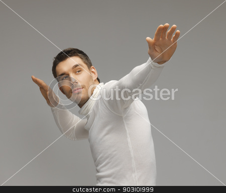 To use this stock image in your creative project, please select the size you need over to the right and click the "Add to Cart" button.
Your downloaded image will come with the Cutcaster watermark removed so don’t worry about the watermark you see on this page. man working with something imaginary stock photo, picture of futuristic man working with something imaginary. by Syda Productions