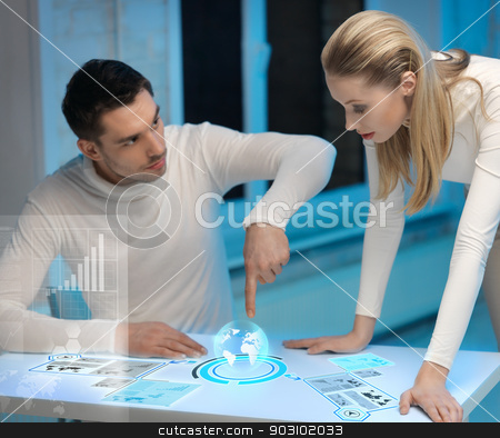 To use this stock image in your creative project, please select the size you need over to the right and click the "Add to Cart" button.
Your downloaded image will come with the Cutcaster watermark removed so don’t worry about the watermark you see on this page. man and woman working with virtual screens stock photo, picture of man and woman working with virtual screens by Syda Productions