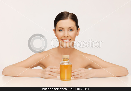 To use this stock image in your creative project, please select the size you need over to the right and click the "Add to Cart" button.
Your downloaded image will come with the Cutcaster watermark removed so don’t worry about the watermark you see on this page. woman with oil bottle stock photo, picture of beautiful woman with oil bottle by Syda Productions
