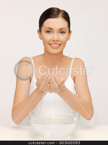 To use this stock image in your creative project, please select the size you need over to the right and click the "Add to Cart" button.
Your downloaded image will come with the Cutcaster watermark removed so don’t worry about the watermark you see on this page. woman washing her face stock photo, bright picture of beautiful woman washing her face by Syda Productions