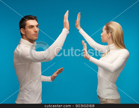 To use this stock image in your creative project, please select the size you need over to the right and click the "Add to Cart" button.
Your downloaded image will come with the Cutcaster watermark removed so don’t worry about the watermark you see on this page. man and woman working with something imaginary stock photo, picture of man and woman working with something imaginary. by Syda Productions