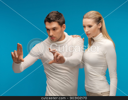 To use this stock image in your creative project, please select the size you need over to the right and click the "Add to Cart" button.
Your downloaded image will come with the Cutcaster watermark removed so don’t worry about the watermark you see on this page. man and woman working with something imaginary stock photo, picture of man and woman working with something imaginary. by Syda Productions