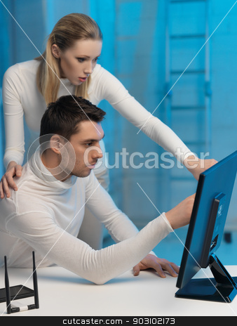 To use this stock image in your creative project, please select the size you need over to the right and click the "Add to Cart" button.
Your downloaded image will come with the Cutcaster watermark removed so don’t worry about the watermark you see on this page. man and woman in laboratory stock photo, picture of man and woman in space laboratory by Syda Productions