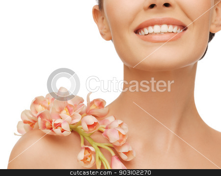 To use this stock image in your creative project, please select the size you need over to the right and click the "Add to Cart" button.
Your downloaded image will come with the Cutcaster watermark removed so don’t worry about the watermark you see on this page. smiling woman with orchid flower on her shoulder stock photo, closeup picture of smiling woman with orchid flower on her shoulder by Syda Productions