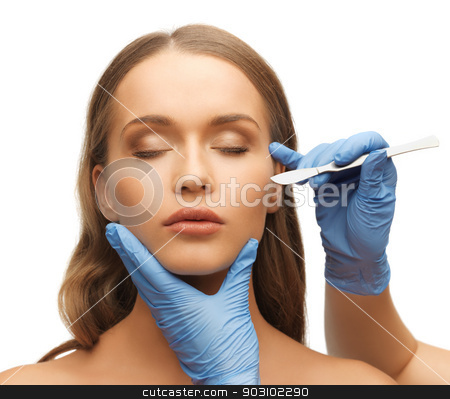 To use this stock image in your creative project, please select the size you need over to the right and click the "Add to Cart" button.
Your downloaded image will come with the Cutcaster watermark removed so don’t worry about the watermark you see on this page. woman face and beautician hands stock photo, picture of woman face and beautician hands with scalpel by Syda Productions