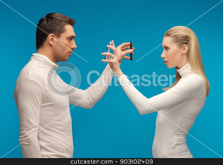 To use this stock image in your creative project, please select the size you need over to the right and click the "Add to Cart" button.
Your downloaded image will come with the Cutcaster watermark removed so don’t worry about the watermark you see on this page. man and woman with modern gadgets stock photo, picture of man and woman with modern gadgets by Syda Productions