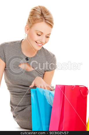 To use this stock image in your creative project, please select the size you need over to the right and click the "Add to Cart" button.
Your downloaded image will come with the Cutcaster watermark removed so don’t worry about the watermark you see on this page. woman with shopping bags stock photo, picture of lovely woman with shopping bags by Syda Productions