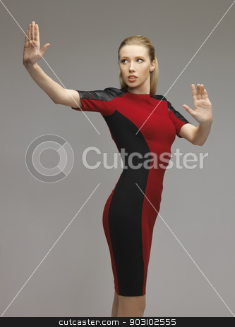 To use this stock image in your creative project, please select the size you need over to the right and click the "Add to Cart" button.
Your downloaded image will come with the Cutcaster watermark removed so don’t worry about the watermark you see on this page. woman working with something imaginary stock photo, picture of futuristic woman working with something imaginary by Syda Productions